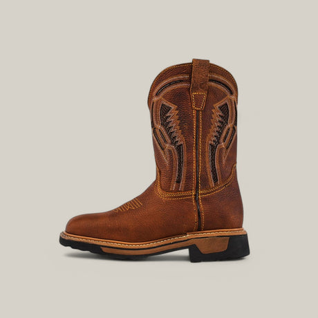 The Floter Honey Composite Toe - E6987 is a durable brown leather work boot by Texas Country, featuring intricate shaft stitching, a convenient pull loop, and a black heel. The background is plain light gray.