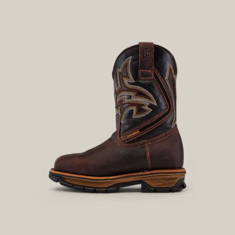 The Amazonas Chocolate Composite Toe - E6002 boasts dark brown leather adorned with intricate tan and orange stitching, known for its durability. Its rugged sole enhances its Texas Country Work Boots appeal, while pull tabs offer convenience. Displayed on a neutral background in side profile.