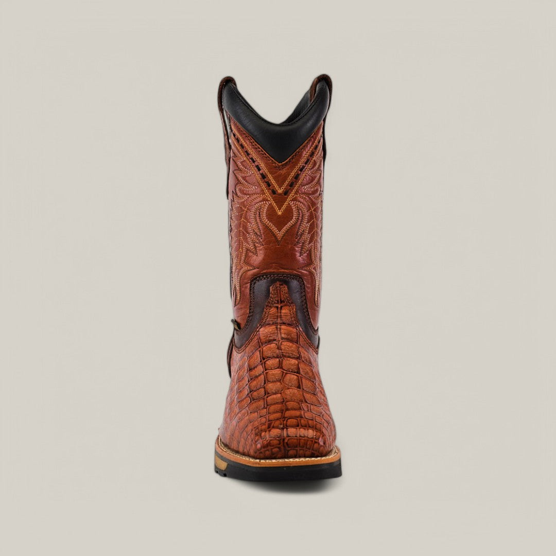 The Alligator Print Cogñac Composite Toe - E6022 offers durability with its intricate stitching and embossed texture. Viewed from the front on a plain background, these brown leather boots promise sturdy craftsmanship perfect for rugged tasks.