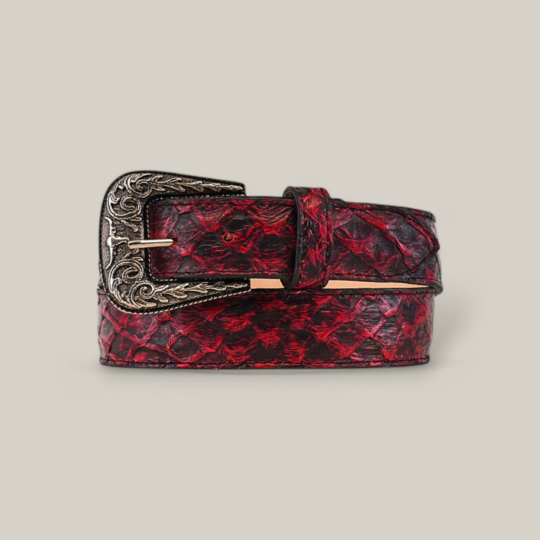 The Exotic Full Quilt Pirarucu Fish - Texas Buckle - Black Cherry Belt features red leather with a textured crisscross pattern and an ornate silver buckle, coiled elegantly on a neutral background.