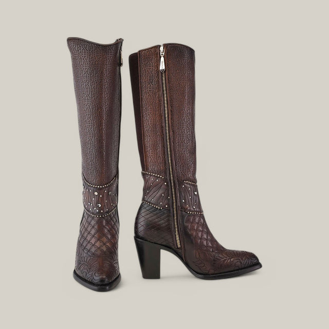 The Black/Brown Embroidery & Studs - Round Toe - CU584 Cuadra Boots in tall brown leather display embossed patterns and delicate embroidery, featuring a side zip, decorative studs, and a mid-sized block heel. They are beautifully showcased against a neutral background.