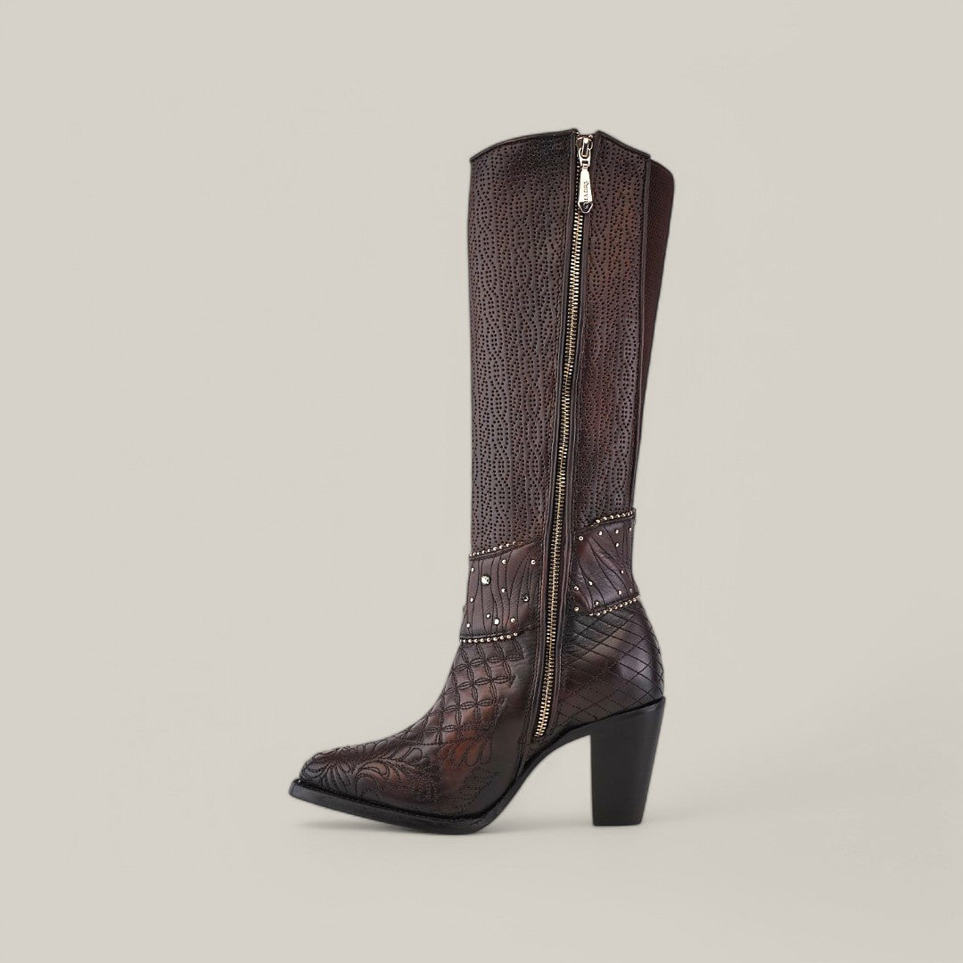 The Black/Brown Embroidery & Studs - Round Toe CU584 boots are knee-high wonders with intricate embroidery and a tall block heel. With a side zipper and decorative metal studs near the ankle, these boots beautifully stand out against a plain, light background.