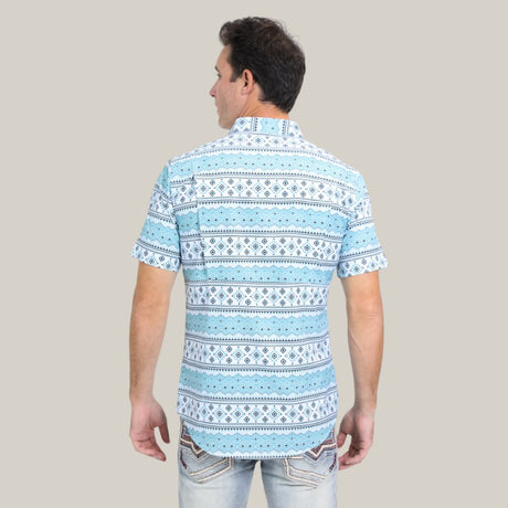 A man with short dark hair faces away, wearing the Mens Performance Western Short Sleeve Aztec Print White Shirt - PGS10627 and light blue jeans, standing against a plain beige background.