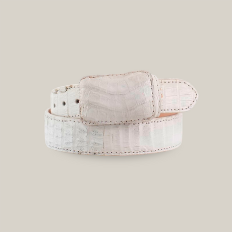 The Exotic Full Quilt Caiman - White Belt features a crocodile-like pattern with a textured design and a rectangular buckle. Displayed coiled against a plain white background, it showcases its craftsmanship beautifully.