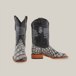 A pair of American Alligator Print Rustic Black - Square Toe boots with black shafts, gray textured cowhide leather resembling alligator print on the foot, wooden soles, and intricate shaft stitching displayed against a white background.