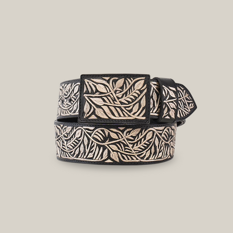 The Artisanal Handmade Silver Belt Branches is a stylish, handcrafted accessory with a black base featuring intricate embossed leaf patterns in contrasting light colors, accentuated by silver thread embroidery for a touch of luxury.