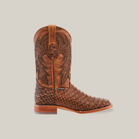 A single rustic brown cowboy boot with a square toe features intricate stitched designs on the shaft and a textured jumbo python print on the foot, set against a plain white background.