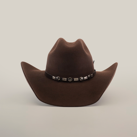 The 6X Chihuahua Brown is a Western hat, expertly crafted from premium sheep wool. It features a wide brim and decorative band with metal conchos, set against a plain white background.