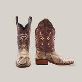 The Exotic Python Patchwork Natural Square Toe cowboy boots feature premium python leather with intricate geometric patterns in brown and red on the shafts, offering a natural square toe design with one boot facing forward and the other turned sideways for unique style.