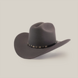 The 100X Sinaloa Oxford is a gray cowboy hat made from soft sheeps wool, featuring a wide brim and a black band with silver conchos. It captures Western heritage beautifully, set against a white surface on a plain background.