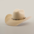 The 6X Chihuahua Bone is a cream-colored felt hat with a wide brim and a decorative band with metal accents around the crown, displayed against a white background.