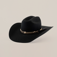 The 6X Doble SS Black is a meticulously crafted black sheeps wool cowboy hat featuring a wide brim, star-accented band with a feather, and exudes timeless style on its white backdrop.