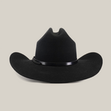 The 6X Dallas Black felt hat, featuring a wide curved brim and sleek leather band, showcases classic Western sophistication as it sits upright against a white background.