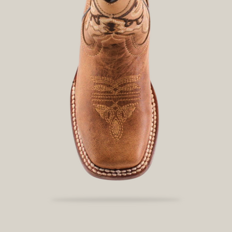 A close-up of the Matcat Fawn - Square Toe boot, featuring premium leather with intricate toe embroidery and decorative edge stitching, set against a white background.