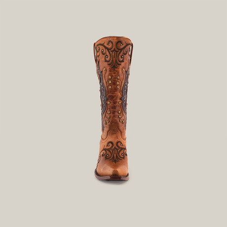 The Elegant Orix boot, with its mid shaft and snip toe, showcases intricate embroidery and stitching in a sophisticated silhouette. Its the epitome of elegance against the white background.