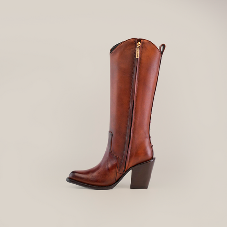 The Francia Rings Tall Shaft Tan - J Toe boot from the Platinum Collection showcases premium brown leather with a side zipper and block heel. Its sleek design embodies classic style against a plain white backdrop.