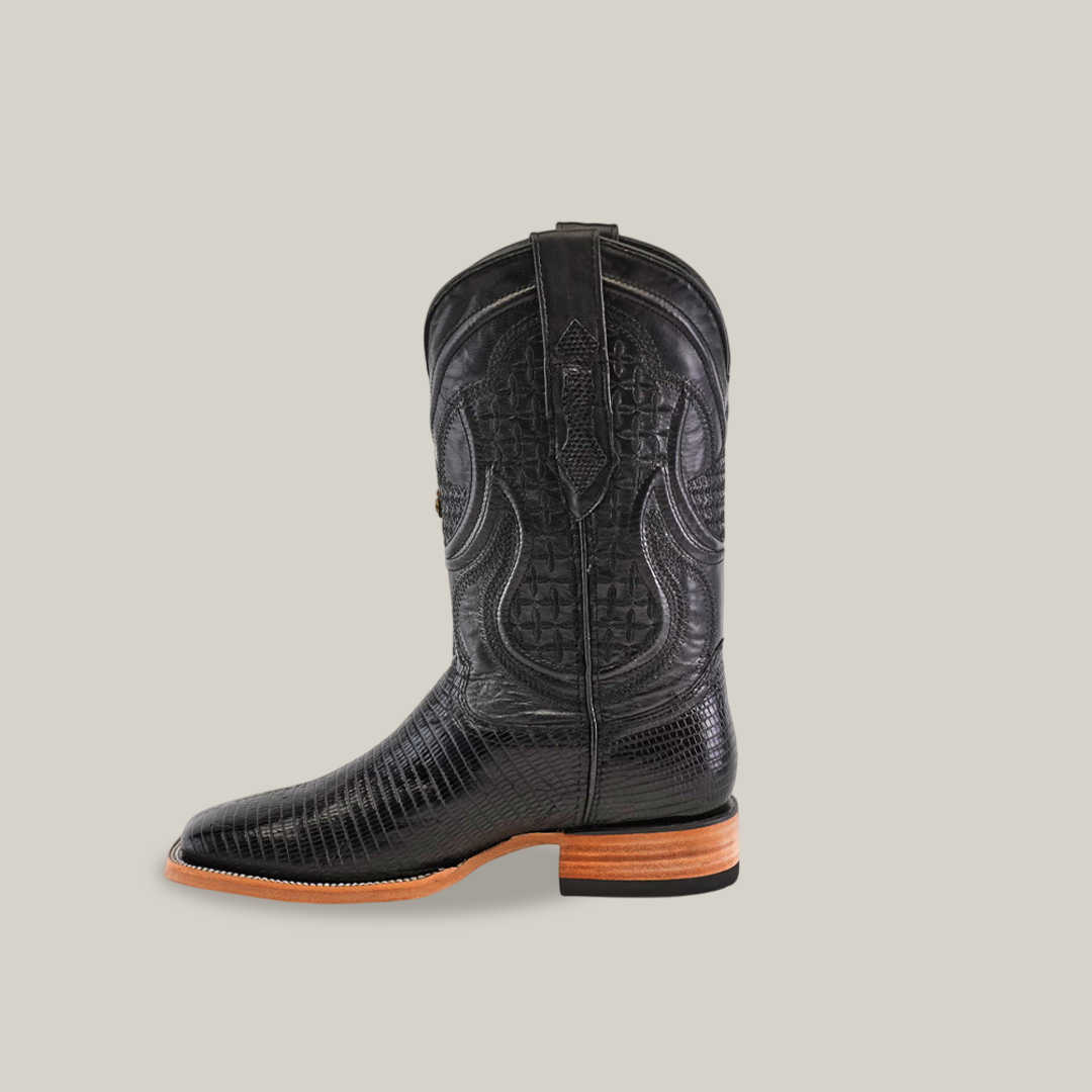 The Exotic Lizard - Black boot features intricate stitching, a brown sole and heel, pull straps on the sides, and showcases the unique flair of square toe boots against a plain white background.