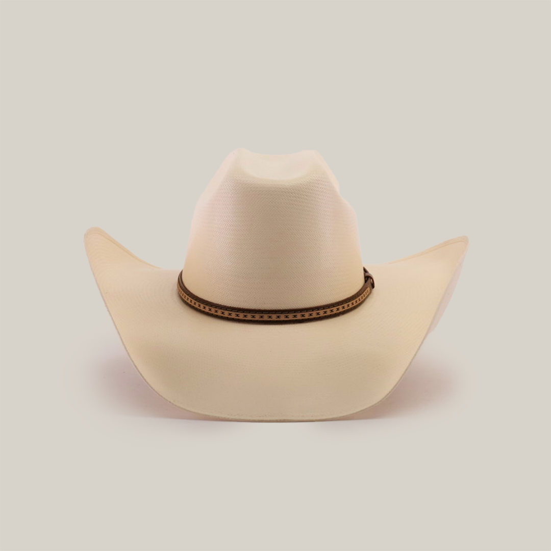 The 1000X Bull Straw Hat, in cream with a brown band, offers durability for outdoor adventures. It is showcased on a plain white background.