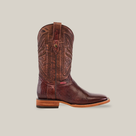 The Exotic Lizard - Brown - Square Toe cowboy boot, crafted from genuine lizard leather, features intricate shaft patterns and a low wooden heel against a plain background.