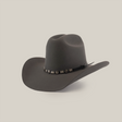 The 6X Leandro Oxford, a dark gray cowboy hat made from premium sheeps wool, boasts a wide brim and a decorative band with metallic accents, set against a plain white background.