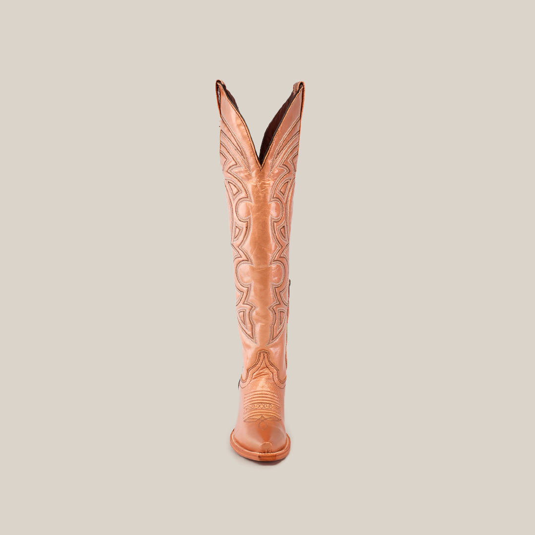 Front view of the Taylor Rose Gold tall shaft cowboy boot in tan featuring intricate stitching and a slightly pointed snip toe, set against a white background.