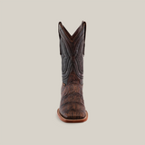 Front view of the Gator Print Rustic Brown cowboy boot, showcasing intricate stitching and texture. This boot features a square toe and raised heel, set against a plain white background.