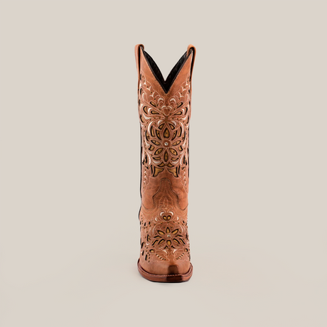 The Kiara Crystals Fawn boot, with a mid shaft and snip toe, is ornately designed in brown. It showcases intricate floral patterns, detailed stitching, cutouts, and crystal embellishments on premium leather against a plain white background.