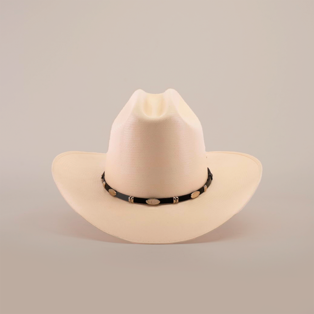 The 1000X Dos Carnales Straw Hat, an exceptional beige cowboy hat with a black band and decorative white oval accents, is displayed against a plain white background.