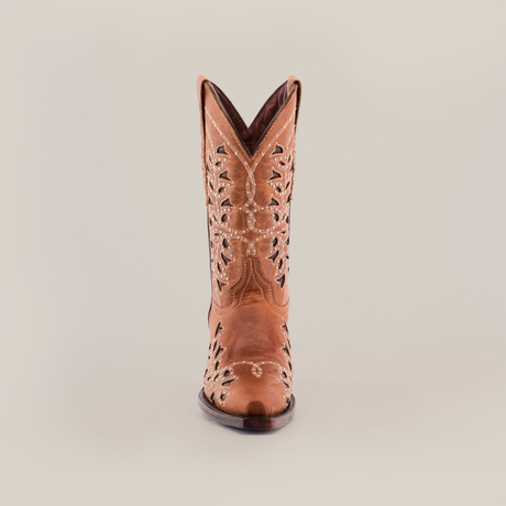 The Flipy Honey - Short Shaft - Snop Toe cowboy boot, centered on a white backdrop, showcases intricate cutout patterns and stitching from the front. This womens boot exemplifies quality craftsmanship with its premium leather sole, highlighting traditional bootmaking artistry.