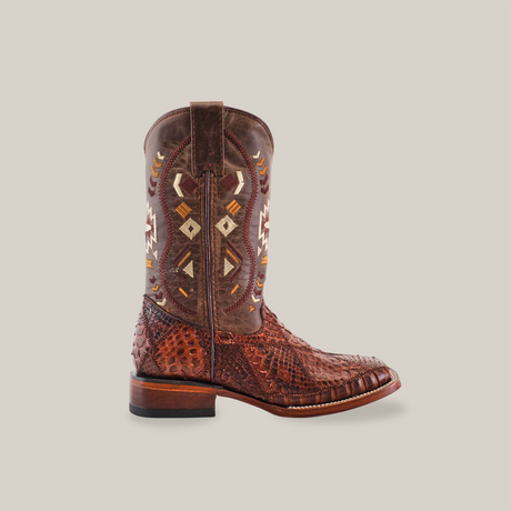 Explore our Exotic Python Patchwork Chocolate Square Toe cowboy boot, featuring a textured surface with intricate embroidery on the shaft. Its stylish square toe, low heel, and convenient pull tab are enhanced by luxurious python leather accents.