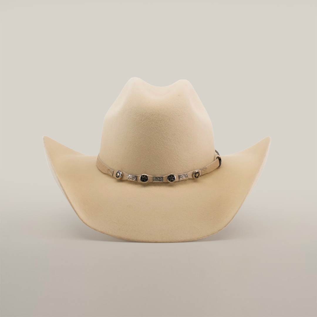 The 6X Chihuahua Bone, a light beige Western hat made from premium sheep wool, boasts a wide brim and a decorated band with metallic accents around the crown, standing out stylishly against a plain white background.