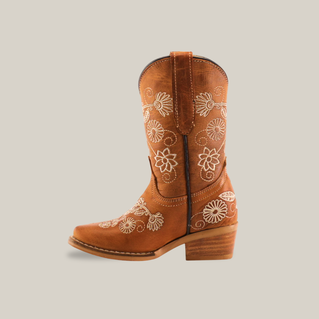 The Rama Honey Snip Toe boot is a genuine leather design for little girls, featuring a single brown cowboy style with a block heel, white floral embroidery, a slightly pointed toe, and a convenient pull tab.