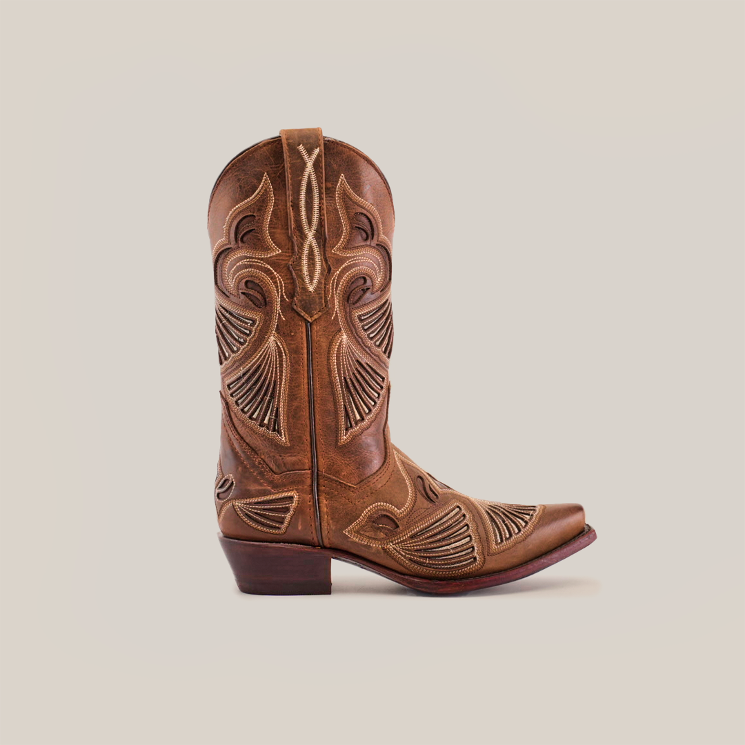 The Shan Camel - Short Shaft - Snip Toe boots are crafted from premium leather, featuring intricate stitching and classic western-style patterns. These essentials have a snip toe and low heel, set against a white background.