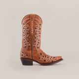 The Flipy Honey - Short Shaft - Snop Toe is a brown cowboy boot with detailed cutout designs and embroidery. Featuring a pointed toe, raised heel, and crafted with traditional artistry on premium leather soles for durability. Set against a plain white background, its perfect for stylish womens boots preferences.