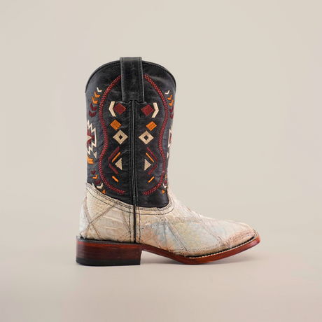 The Exotic American Alligator Patchwork Bone Square Toe boot features a black-and-white alligator skin with red, yellow, and white geometric designs on the shaft and brown patchwork accents on the heel and square toe.