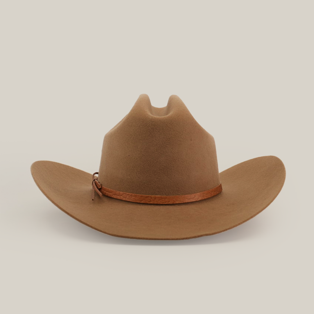 The 6X Sinaloa Fawn is a tan cowboy hat made from sheeps wool, featuring a wide brim and brown leather hatband that embodies rich Western heritage, isolated on a white background.