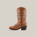 The Kiara Crystals Fawn boot, a single brown cowboy boot with intricate floral embroidery, is made from premium leather. It boasts a snip toe, low heel, and pull-on design, all showcased on a plain white background to emphasize its elegant craftsmanship.