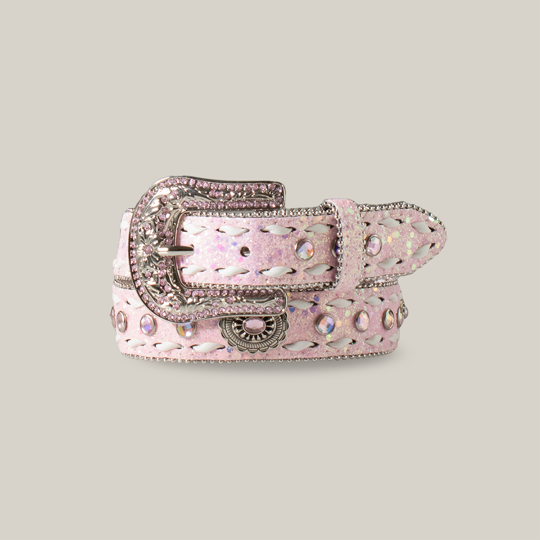 The Angel Ranch Girls Belt in Glitter Crystal Buck Lacing Pink features a Western-inspired design with sparkling rhinestones, a large ornate silver buckle, and an intricate stitched pattern, ideal for young cowgirls.