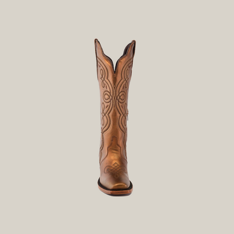 A single brown Eden Copper Tall Shaft boot with intricate embroidery on the shaft and toe, crafted from premium leather, stands upright against a plain white backdrop, facing forward to showcase its detailed design and luxurious craftsmanship.