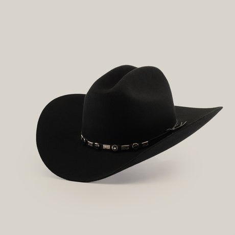 The 6X Sinaloa Black cowboy hat features a wide brim and decorative band with silver conchos, celebrating Western heritage. Its showcased on a plain white background.