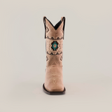 The Palles Aztec Stitch Fawn boot, with a short shaft and square toe, is crafted from premium leather. It features intricate Western-style patterns centered around a teal and brown geometric design, highlighting expert craftsmanship against a plain white background.