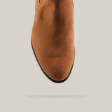 A close-up view of the front of a Prime Suede Sand Round Toe with a round toe, set against a plain white background.