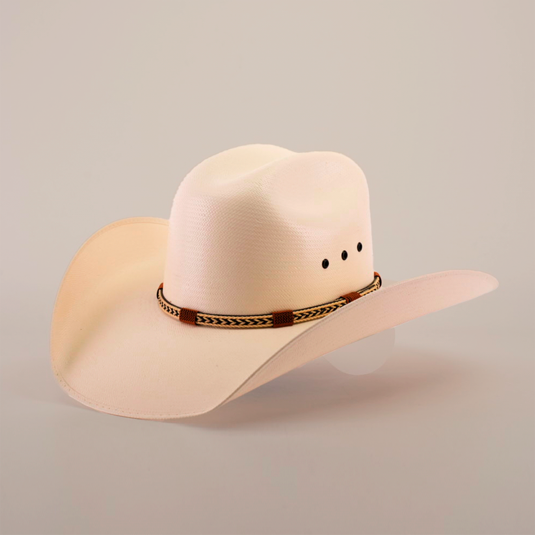 The 500X Chihuahua Straw Hat, renowned for its durability, features a wide brim and decorative band, exuding timeless style against a plain, light background.