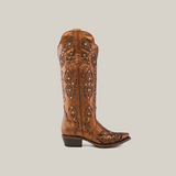 Side view of the Rania Copper - Tall Shaft - Snip Toe boot, highlighting its decorative stitching, mid-height heel, and pull straps. This handcrafted leather cowboy boot is set against a plain white background.