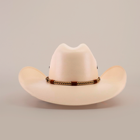 The 500X Chihuahua Straw Hat, in cream color with a wide brim and braided band, showcases style and durability. Artfully positioned against a white background, it highlights timeless elegance.