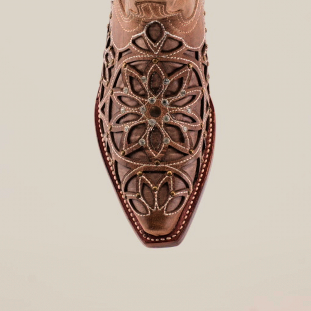 A close-up of the Vitralli Crystals - Mid Shaft - Snip Toe cowboy boots reveals intricate floral embroidery and dark crystals on the toe. The detailed stitching and ornate designs create an elegant look against a light background.