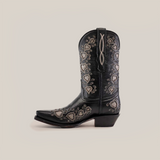 Explore the luxury of Studded Hearts Black - Short Shaft - Snip Toe boots, showcasing exquisite silver heart and floral embroidery along the shaft and foot. These handcrafted cowboy boots blend a pointed toe and medium heel, offering timeless elegance.