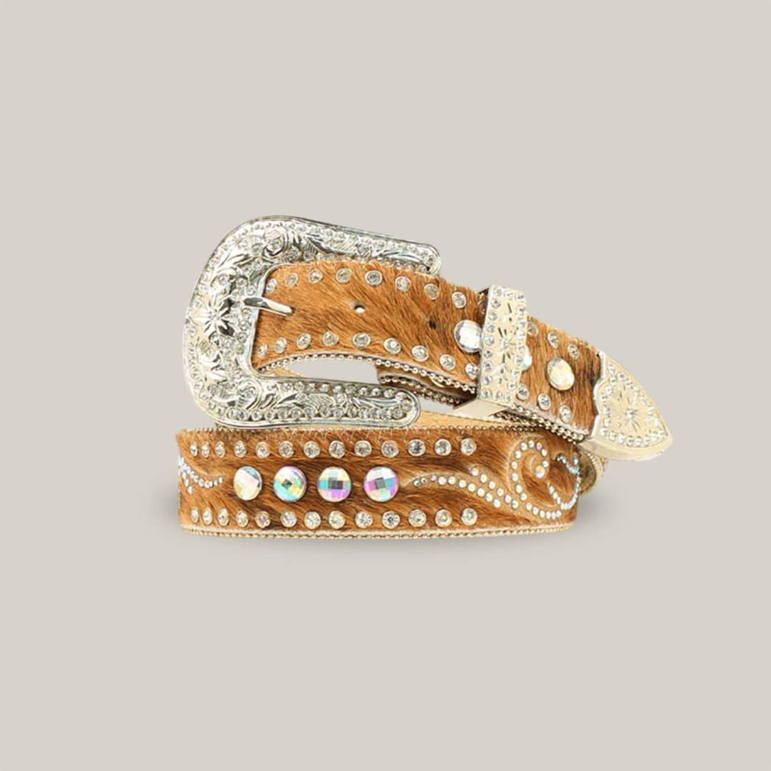 The Nocona Western Womens Belt, model N3483602, is a handcrafted brown leather belt featuring an ornate silver buckle and tip, decorated with rhinestones and detailed stitching for a touch of Western elegance and artisanal flair.