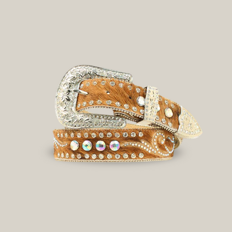 The Nocona Western Womens Belt, model N3483602, is a handcrafted brown leather belt featuring an ornate silver buckle and tip, decorated with rhinestones and detailed stitching for a touch of Western elegance and artisanal flair.