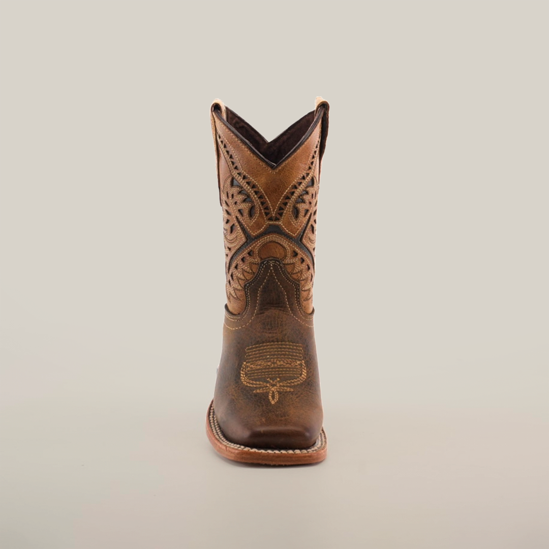 The Azkar Tan Square Toe is a single brown cowboy boot made from cowhide leather, featuring intricate stitching and decorative patterns on its upper shaft against a plain white background.